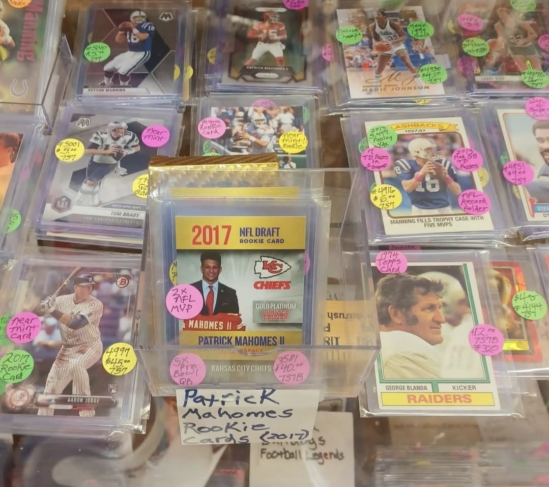 Premium sports cards including Patrick Mahomes rookie