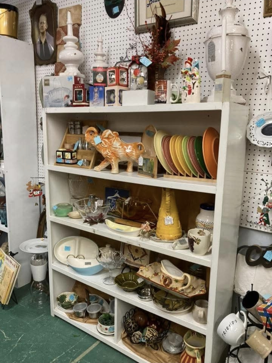 Vintage kitchenware with colorful plates and ceramics